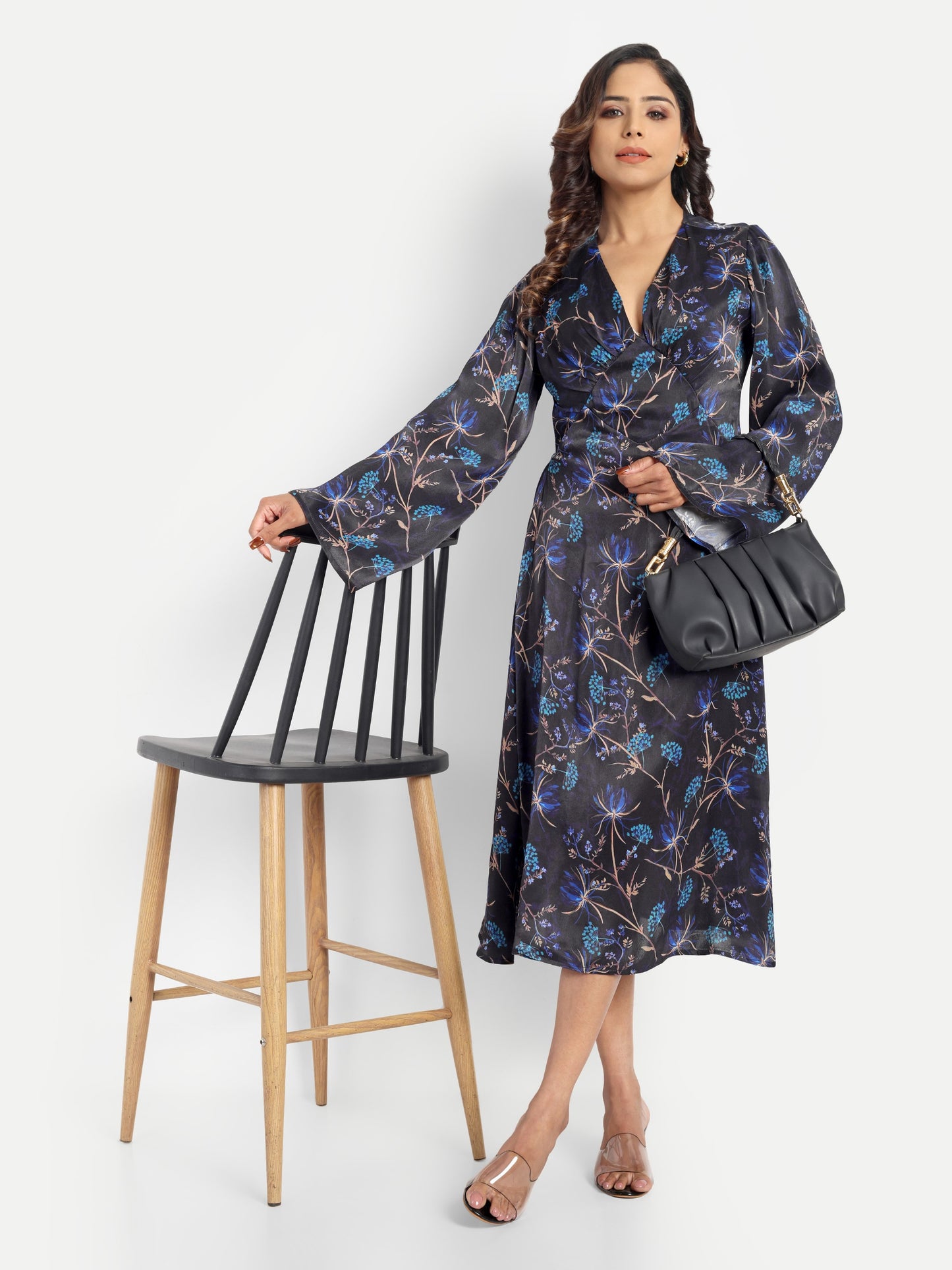 Women’s black and blue floral Reko midi dress with V-neck and elegant flowy fit