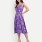 Woman wearing Aifa purple floral sleeveless midi dress