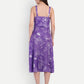 Woman wearing Aifa purple floral sleeveless midi dress