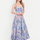 Luxury women’s blue floral Sumi maxi dress with elegant flowy silhouette and designer look