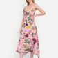 Luxury women’s pink floral Kuto midi dress with elegant flowy silhouette and premium design