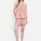 Women's pink floral print high-waist lelo shorts with flared hem and comfortable fit