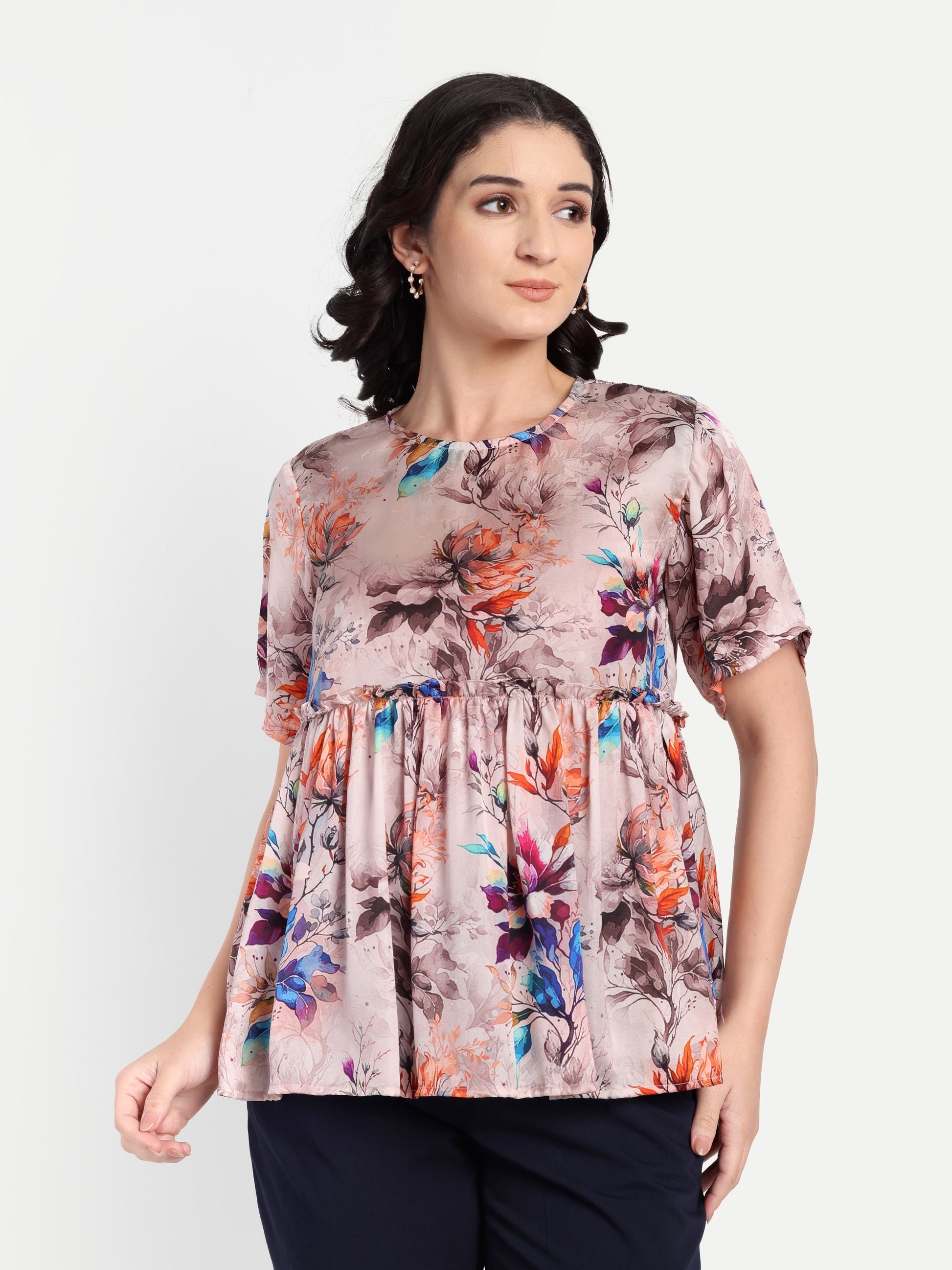 Women’s beige floral Millie top with peplum style, soft flowy fit and elegant stylish design