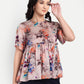 Women’s beige floral Millie top with peplum style, soft flowy fit and elegant stylish design