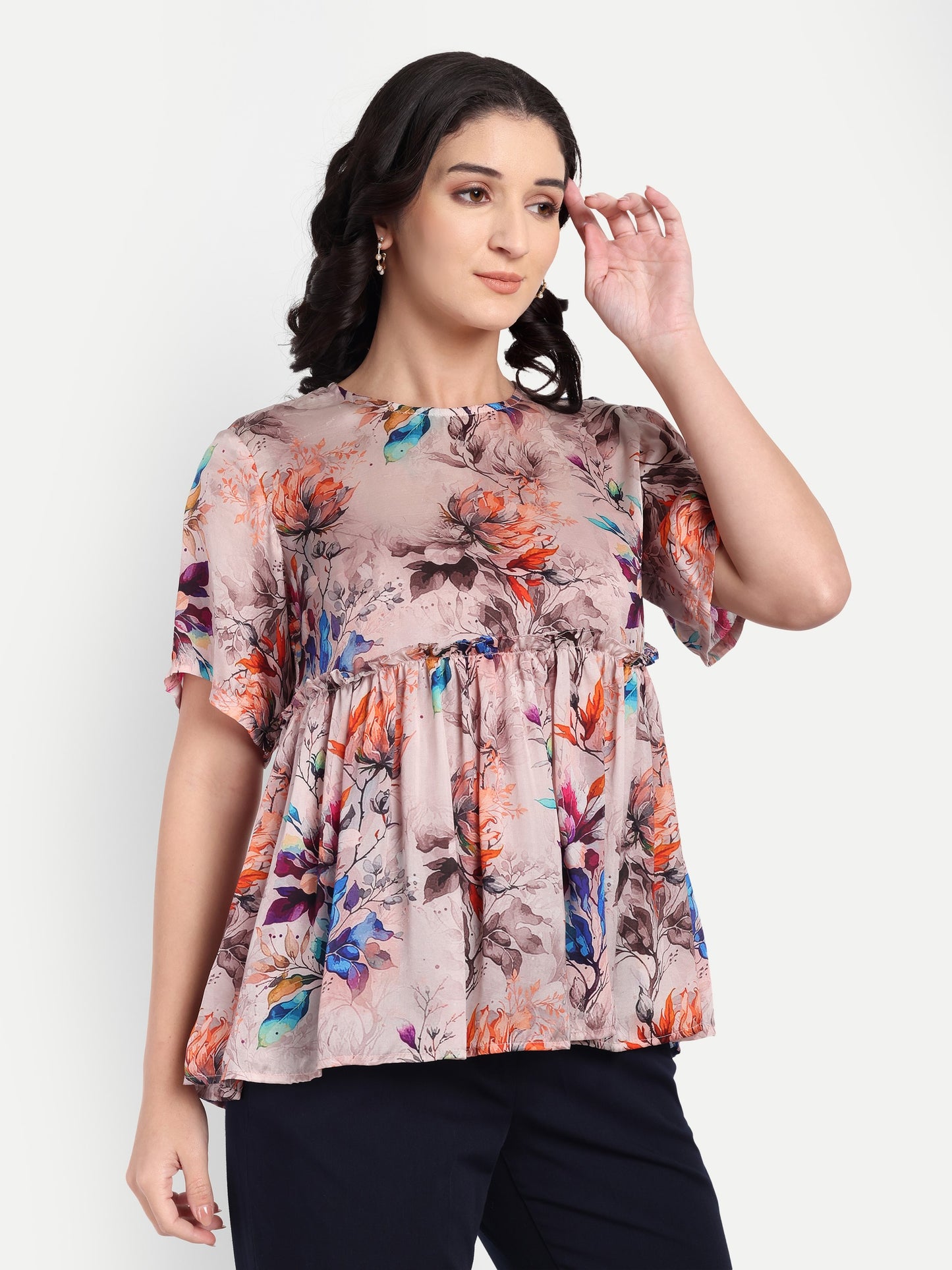 Women’s beige floral Millie top with peplum style, soft flowy fit and elegant stylish design