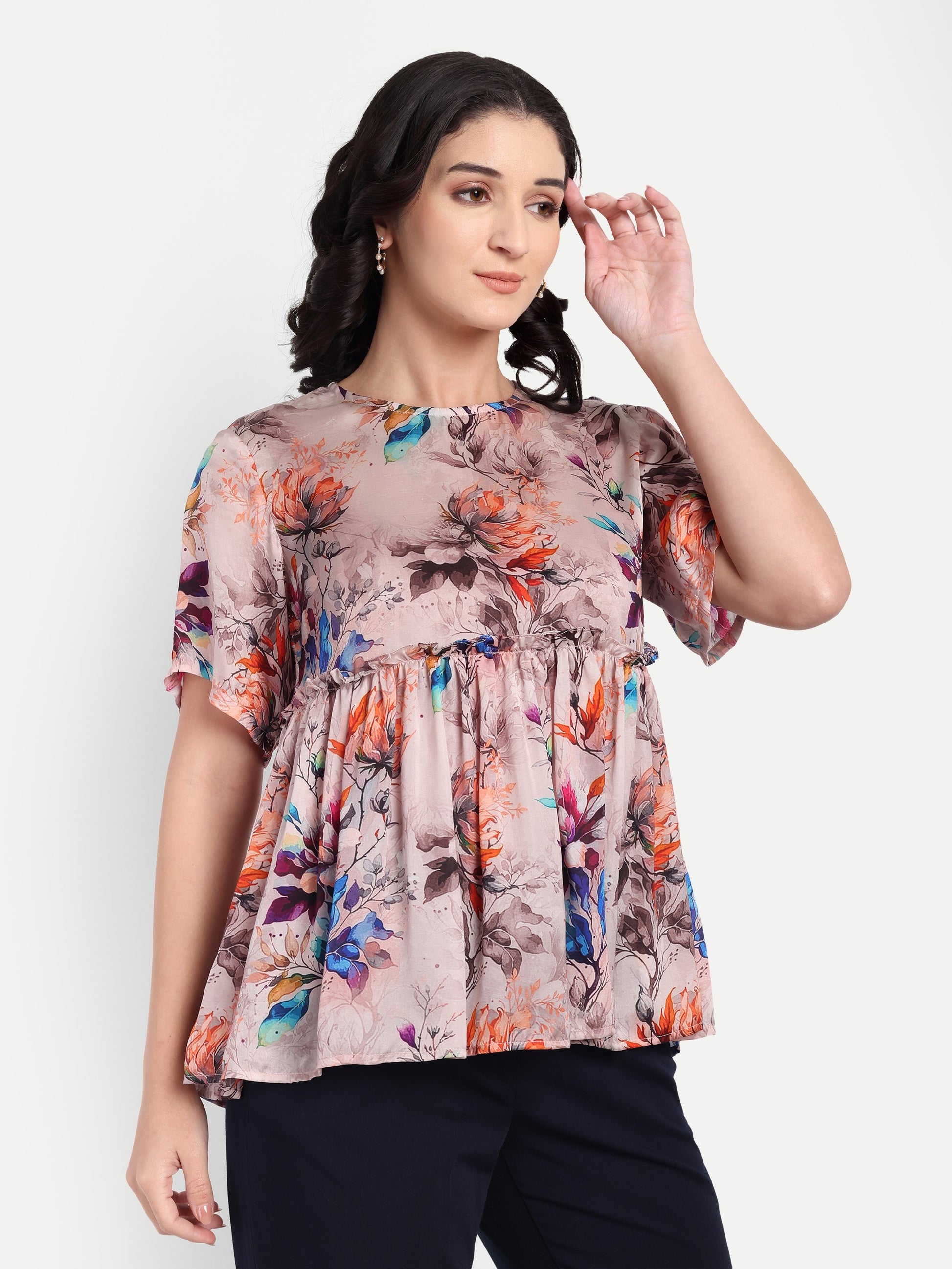 Women’s beige floral Millie top with peplum style, soft flowy fit and elegant stylish design