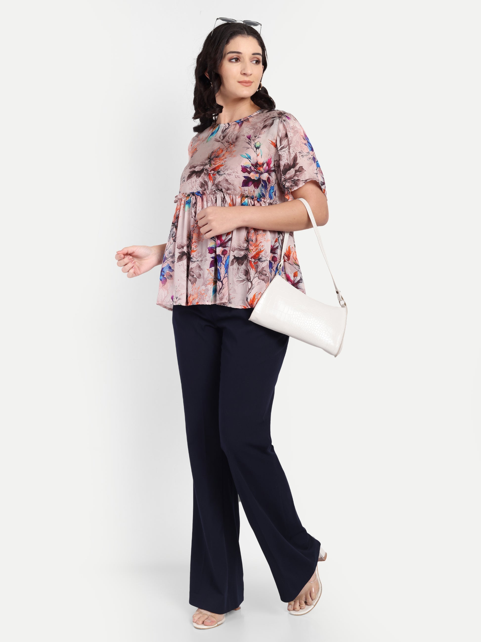 Women’s beige floral Millie top with peplum style, soft flowy fit and elegant stylish design