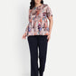 Women’s beige floral Millie top with peplum style, soft flowy fit and elegant stylish design