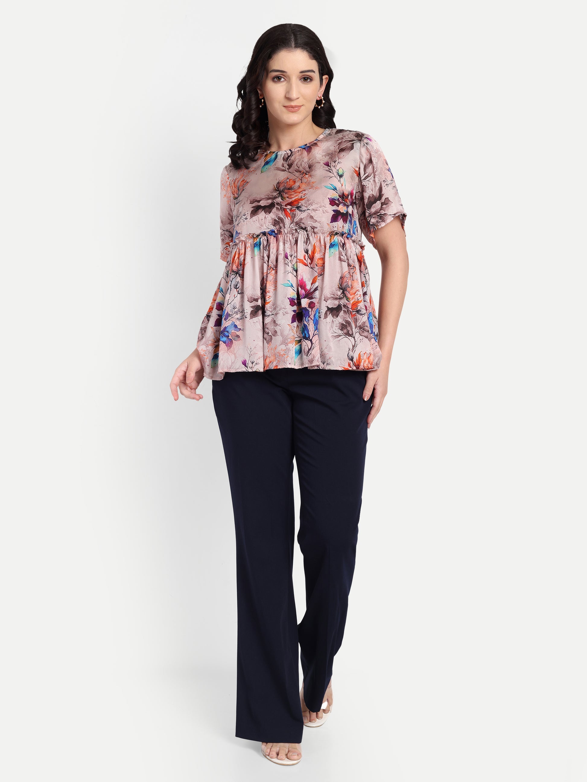 Women’s beige floral Millie top with peplum style, soft flowy fit and elegant stylish design