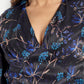Women’s black and blue floral Reko midi dress with V-neck and elegant flowy fit