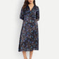 Women’s black and blue floral Reko midi dress with V-neck and elegant flowy fit