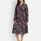 Women’s black printed Luna midi dress with long sleeves, button-down front and elegant fit