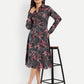 Women’s black printed Luna midi dress with long sleeves, button-down front and elegant fit