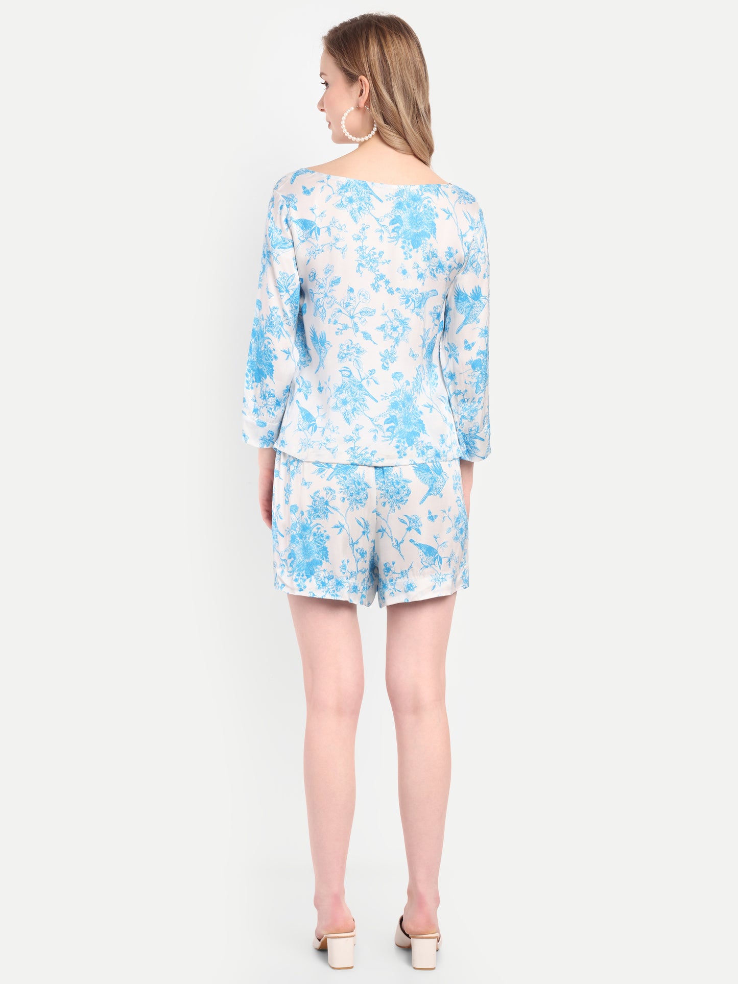 Women’s blue floral Chichi top with long sleeves and relaxed stylish fit