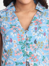 Women’s blue floral Chiki sleeveless jacket with tailored fit and elegant design