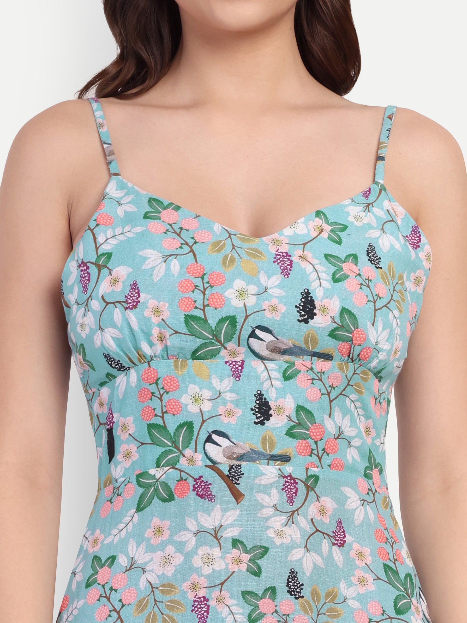 Women’s blue floral Manto midi dress with sleeveless design and fitted silhouette