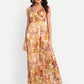 Women’s golden floral Vento maxi dress with halter neck and flowy silhouette