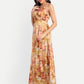 Women’s golden floral Vento maxi dress with halter neck and flowy silhouette