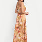 Women’s golden floral Vento maxi dress with halter neck and flowy silhouette
