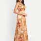 Women’s golden floral Vento maxi dress with halter neck and flowy silhouette