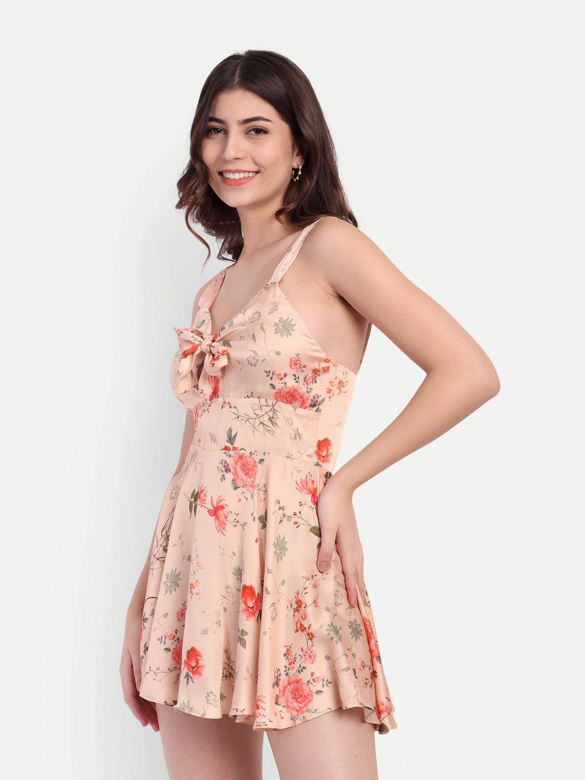 Women’s peach floral Kazo mini dress with sleeveless design and flared fit