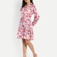 Women’s pink printed Emma dress with long sleeves, tie-up waist and flowy silhouette