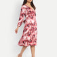 Women’s red printed Dezi midi dress with long sleeves and elegant relaxed fit