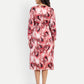 Women’s red printed Dezi midi dress with long sleeves and elegant relaxed fit