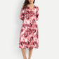 Women’s red printed Dezi midi dress with long sleeves and elegant relaxed fit