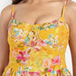 Women’s yellow floral Meto midi dress with strappy sleeves and flowy summer silhouette