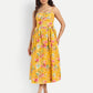 Women’s yellow floral Meto midi dress with strappy sleeves and flowy summer silhouette